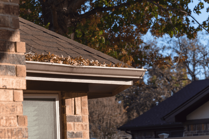 Clogged Gutter System on Suburban Home | One Stop Home Improvement Shop